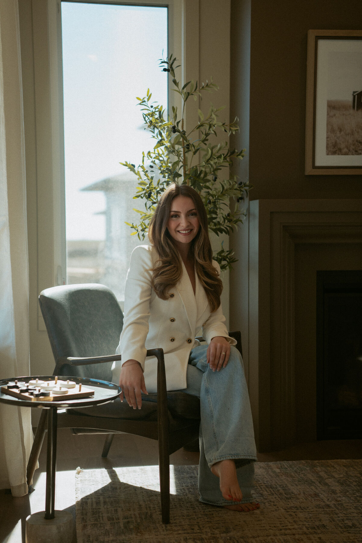 Stephanie Johnston relaxing in a living room